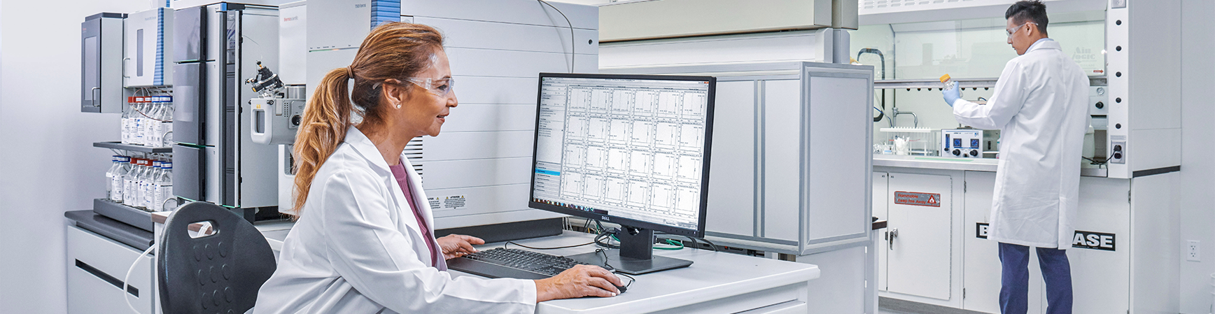 Scientists working with laboratory technology