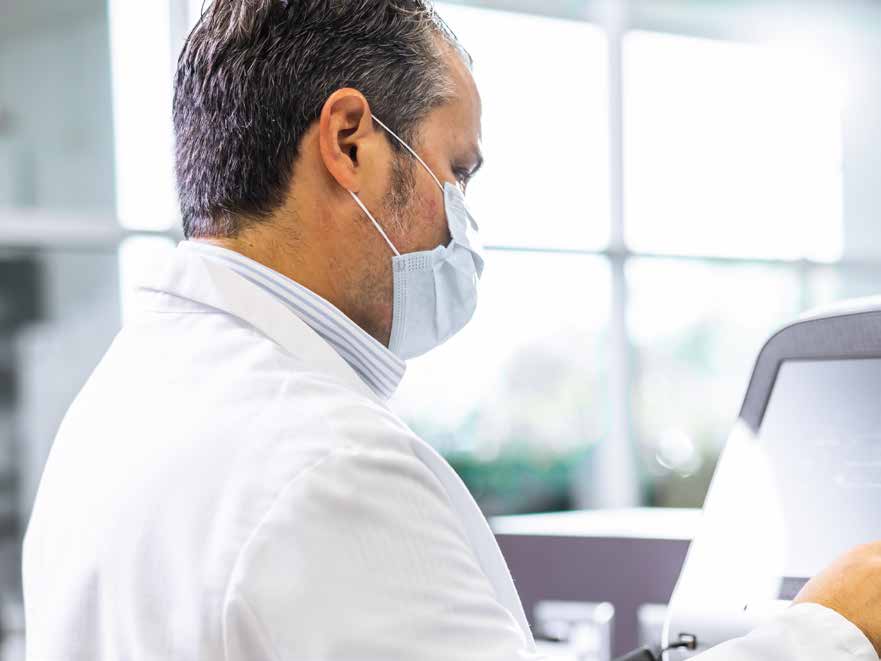 Scientist reviewing laboratory documentation