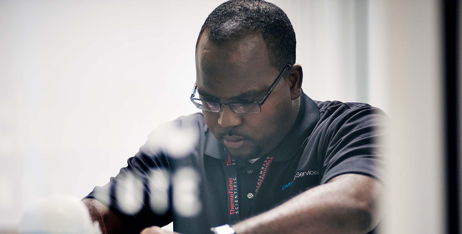 Field service engineer working on laboratory equipment