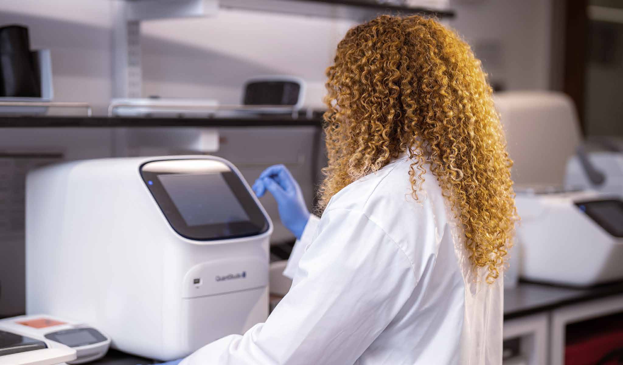 Laboratory colleagues discussing their work